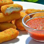Crispy Mozzarella Sticks Paired with Zesty Marinara Sauce