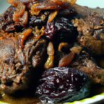 Savor the Rich Flavors of Lamb Tagine with Prunes & Almonds